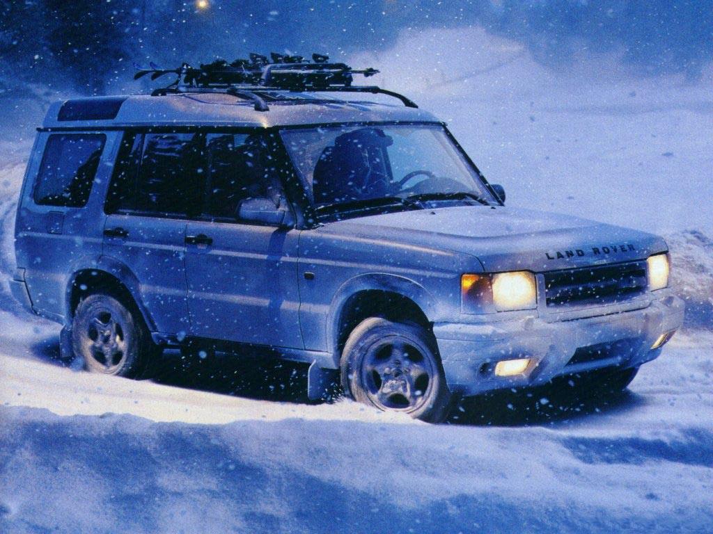 обои Land Rover Discovery в снегах фото