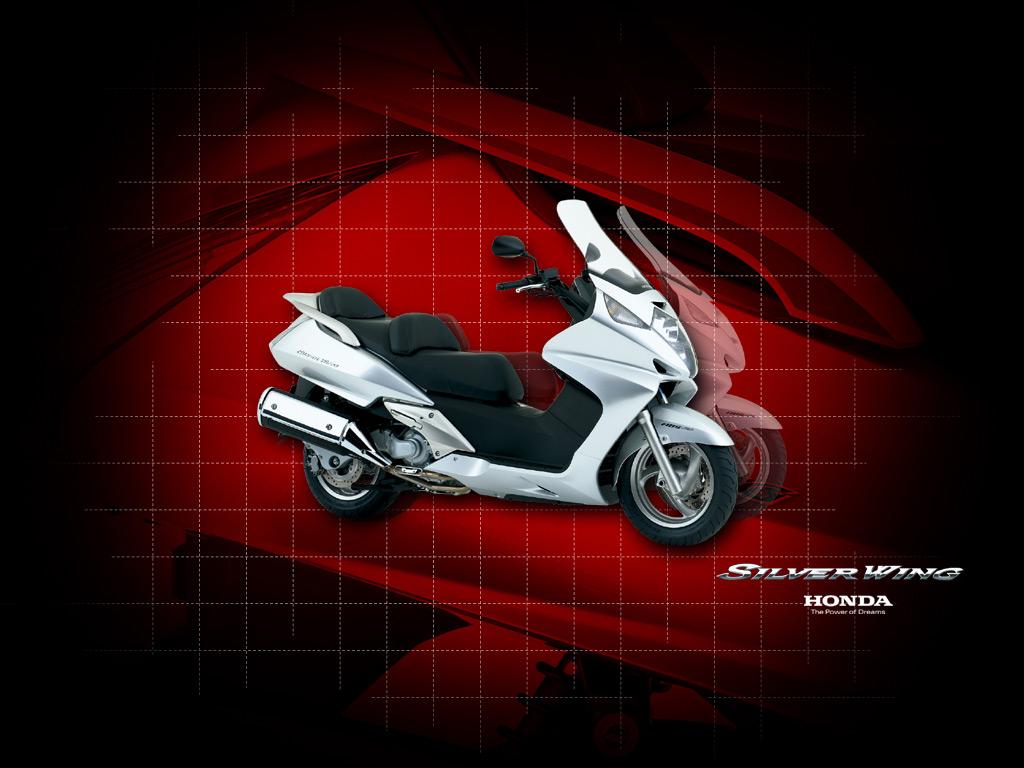 обои Honda silver wing на агрессивном красном фоне фото