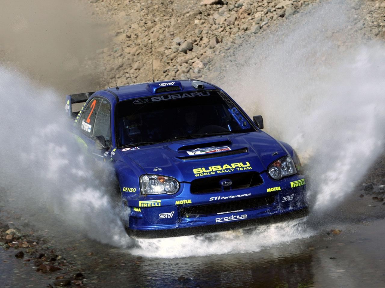 обои Subaru Impreza WRC в воде фото