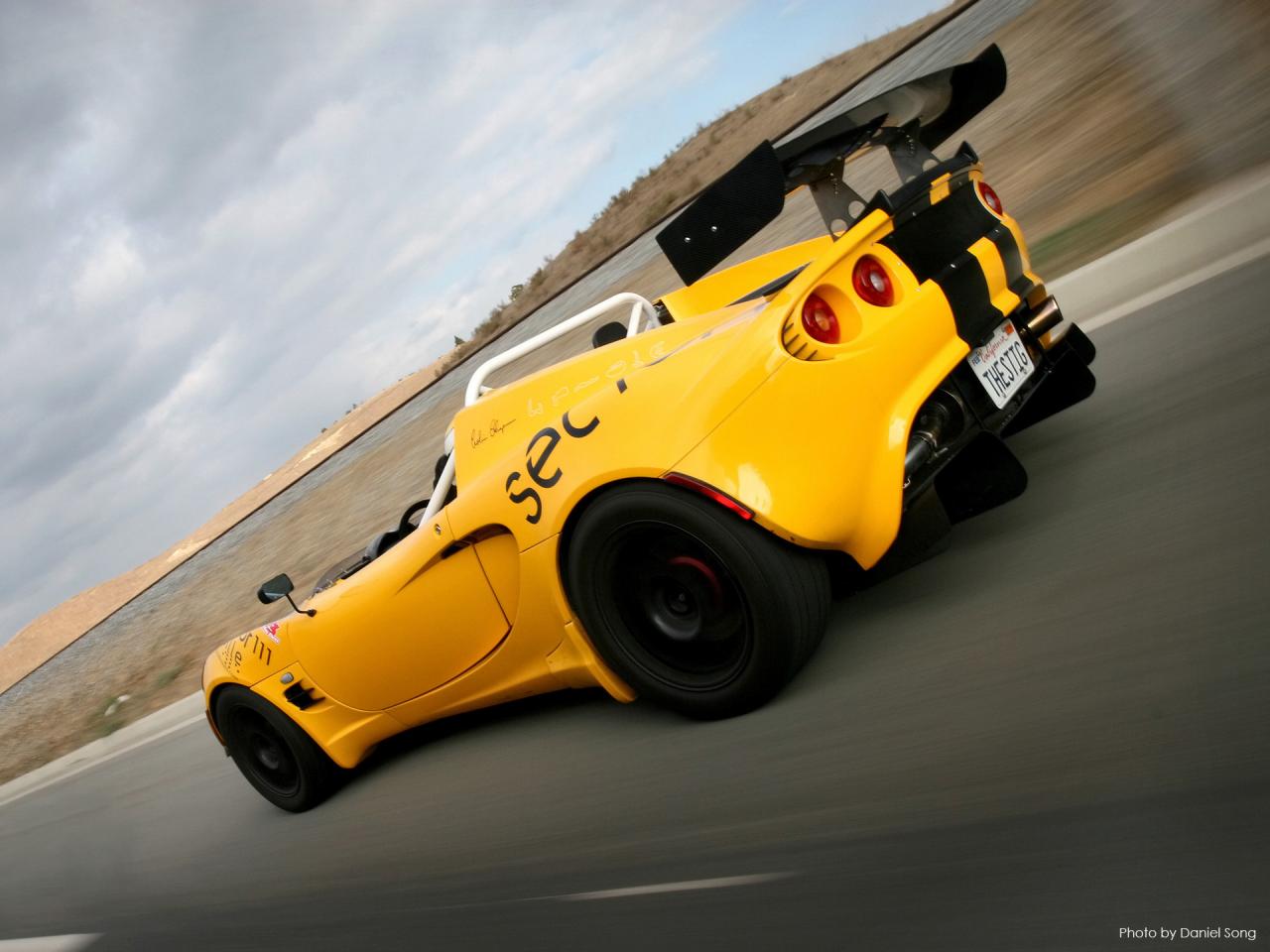 обои Lotus Elise Spyder1 Rear And Side Speed Tilt фото