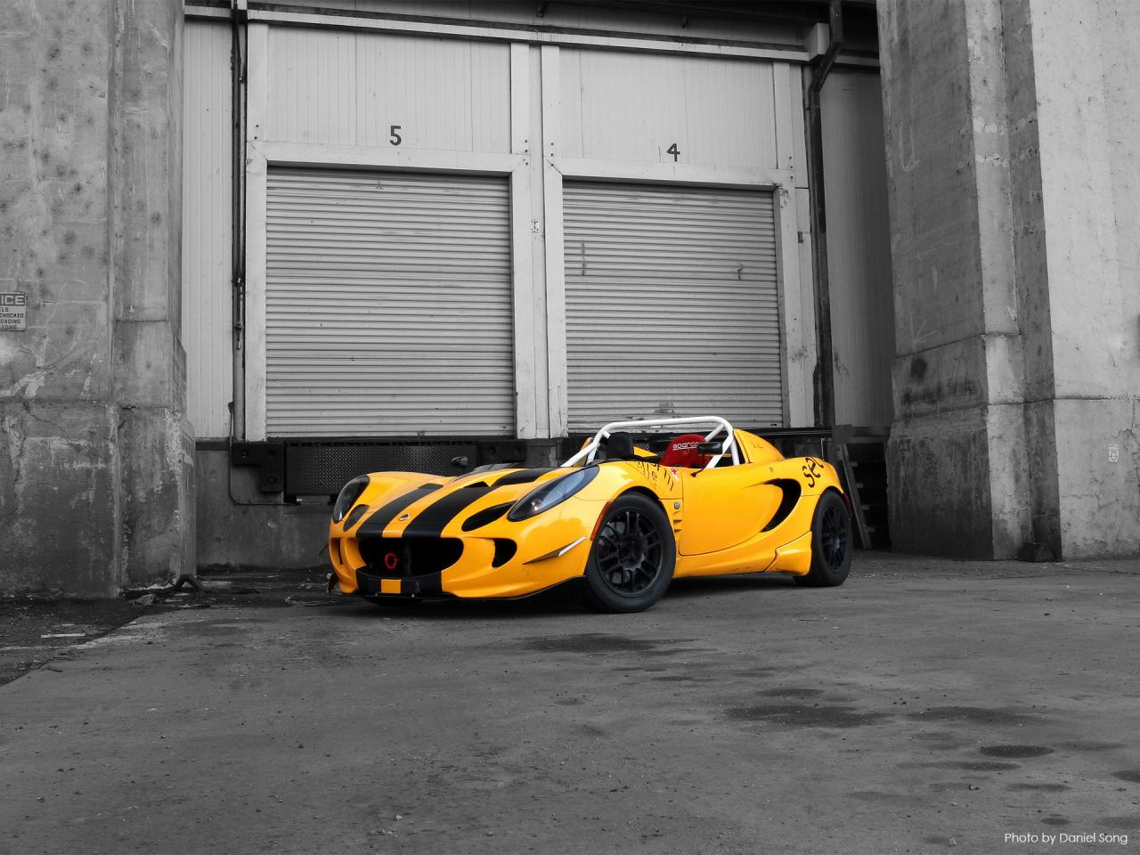 обои Lotus Elise Spyder1 Side Angle Loading Dock фото