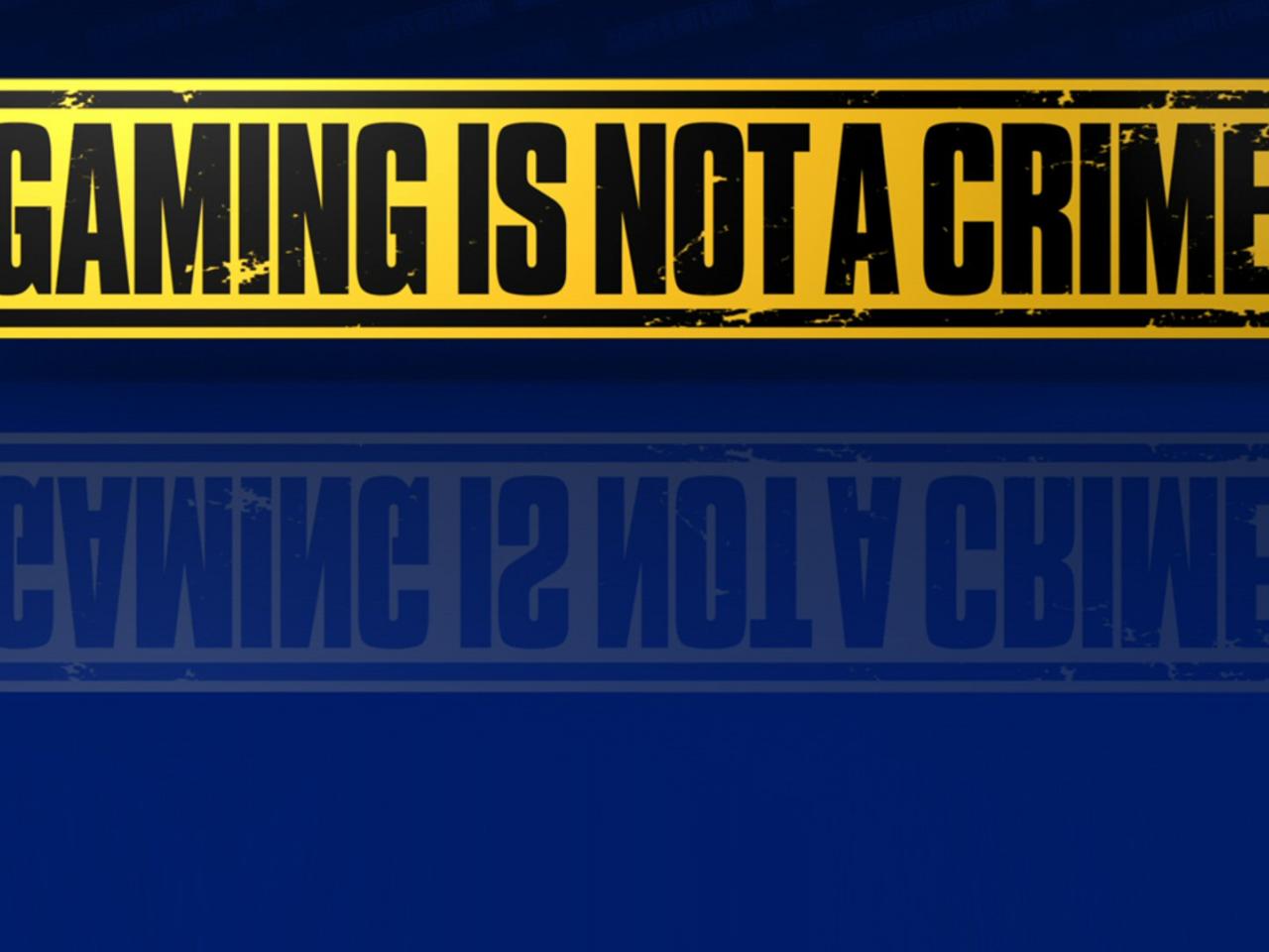 обои Надпись GAMING IS NOT A CRIME фото