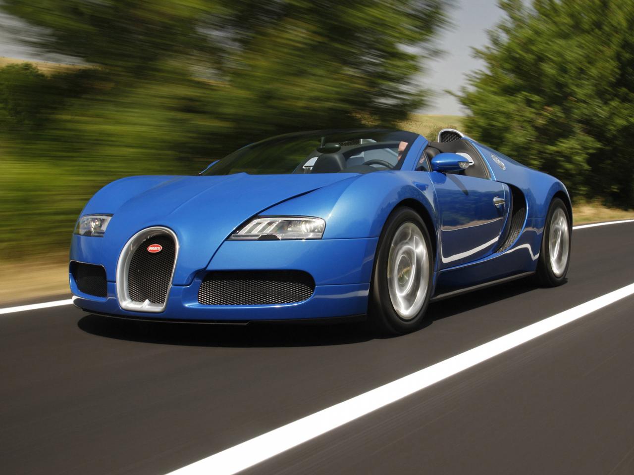 обои Bugatti Veyron Grand Sport Roadster мчиться фото