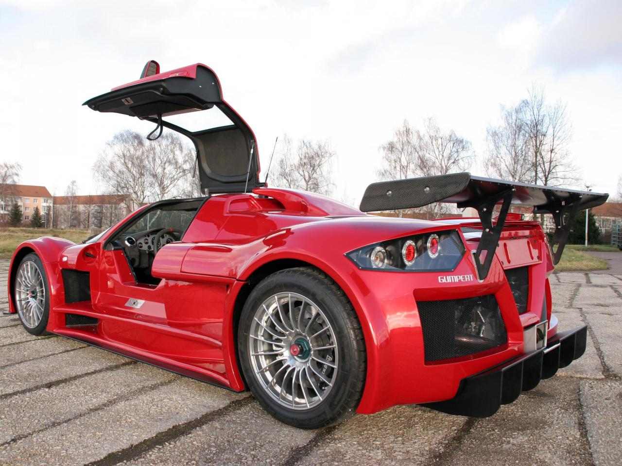 обои Gumpert Apollo Sport 2007 крылья фото