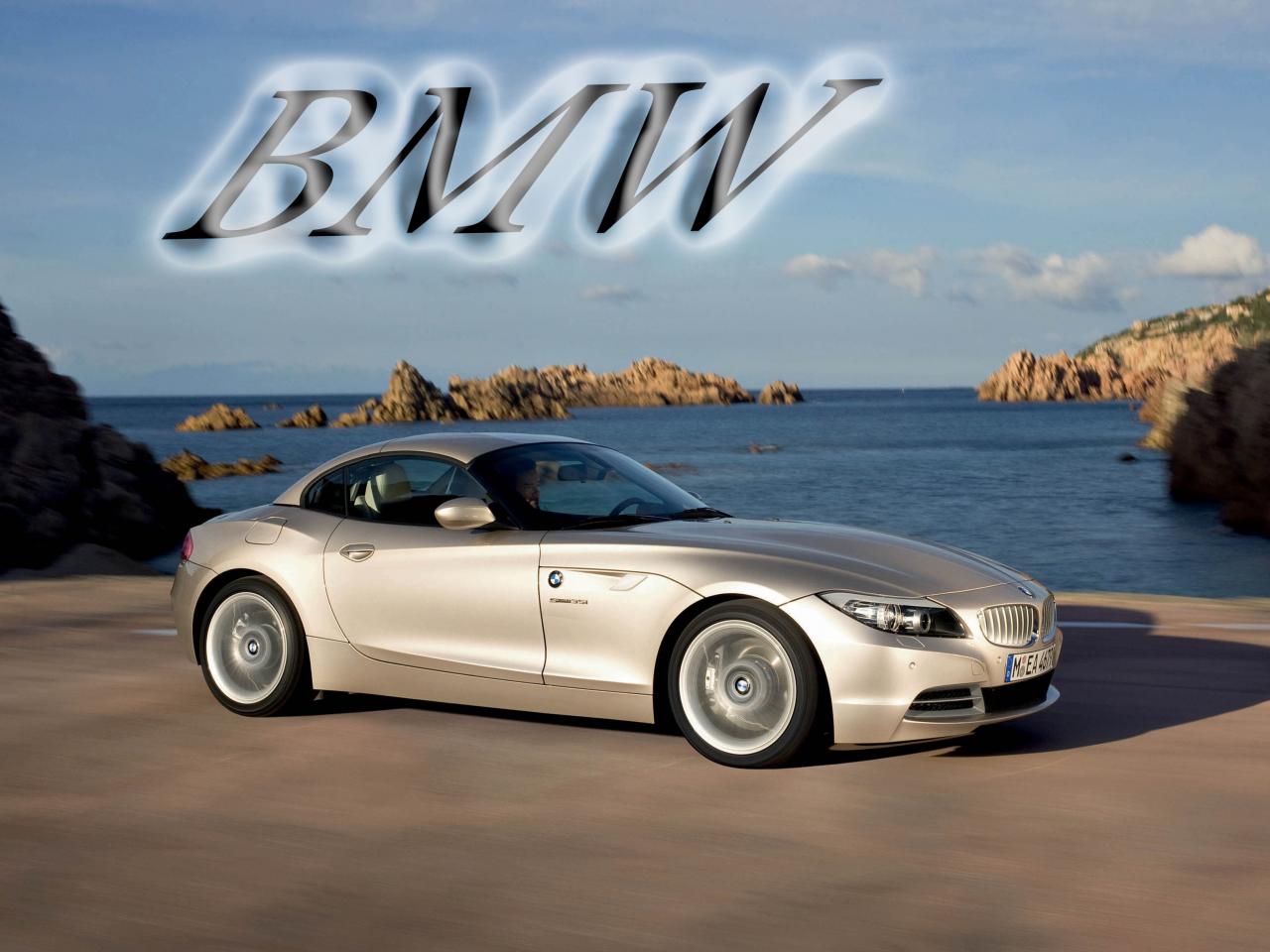 обои BMW  на фоне моря фото