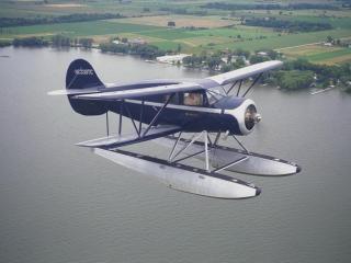 обои Самолет над водой фото