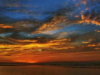 обои Вид неба над океаном на закате солнца фото