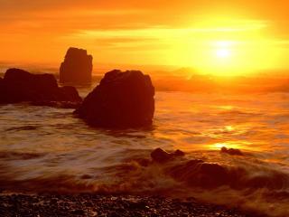 обои Берег морской в оранжевом свете заката фото