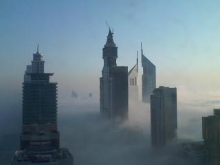 обои хмарочесы в тумане фото