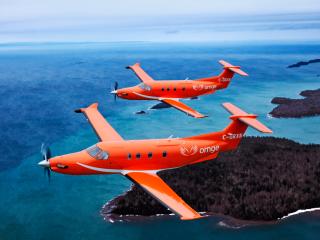 обои Двойка оранжевых самолетов фото