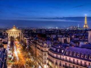 обои Вечерний Париж переливается огнями фото