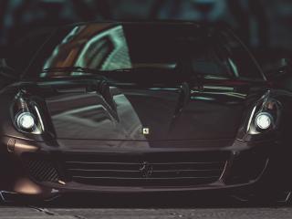 обои Черный Ferrari вид спереди фото