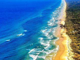 обои Песчанный берег уходящий за горизонт фото