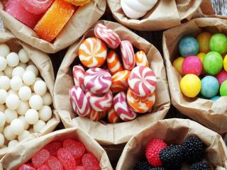 обои Разноцветные сладости в кулёчках фото