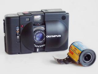 обои Olympus XA camera and film фото