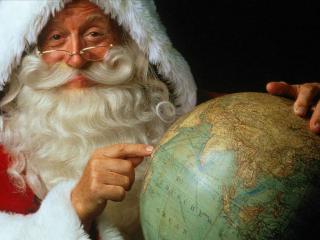 обои Санта Клаус с глобусом фото