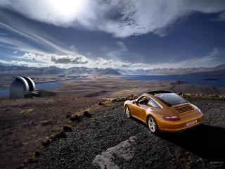 обои Porsche  911 золотисто-коричневый и небо фото