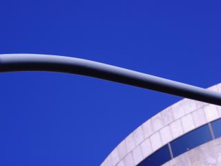 обои Круглое здание на фоне синего неба фото