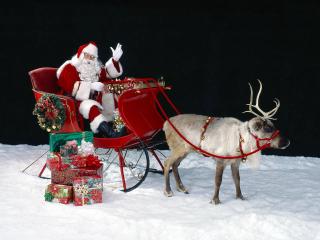 обои Санта - Клаус с оленем фото