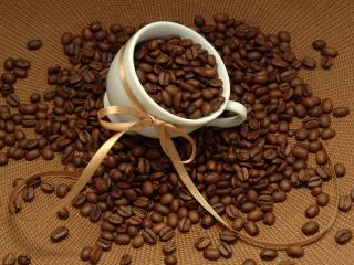 обои Зерна кофе в кружке фото