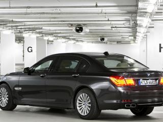 обои BMW_7-secure вид со стороны фары фото