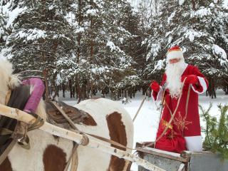 обои Санта-Клаус,   который едет поздравлять детей с Рождеством фото