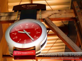 обои Ярко-красные часы,  каким-то загадочным образом связанные с Эверестом фото