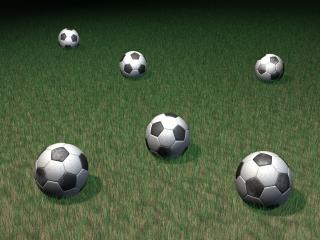 обои Шесть футбольных мячей на зеленом поле фото