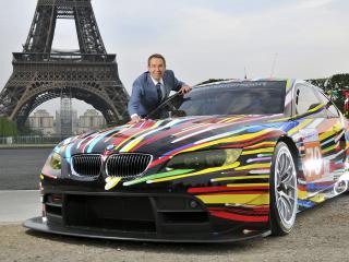 обои BMW-M3-GT2 на фоне Эйфелевой башни фото