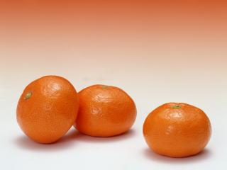 обои Насыщенно-оранжевые мандарины приплюснутой формы фото