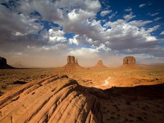 обои A Building Sandstorm Behind the Two Mittens,   Monument Valley,   Utah фото