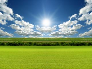 обои Белые облака над зеленым полем фото