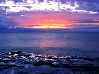 обои Яркие краски заката над морем фото