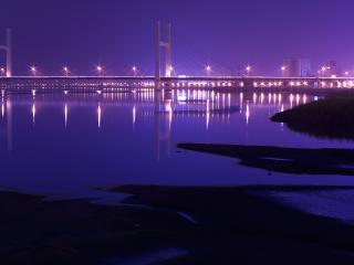 обои Свечение фонарей городского моста фото