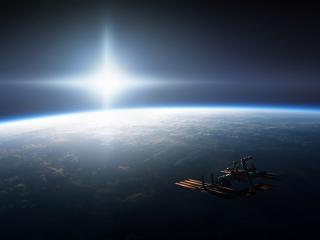 обои Спутник в космосе над землей фото