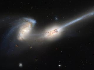 обои Две столкнувшиеся галактики (галактики Мышей) фото