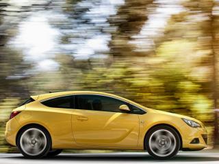 обои Желтая Vauxhall-Astra GTC на скорости фото