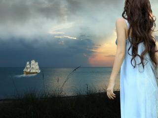 обои Одинокая девушка у моря фото