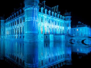 обои Замок ночью в синем свете фото