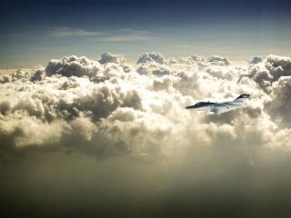 обои Самолет выше облаков фото