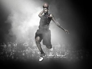 обои Баскетболист lebron james в прыжке с мячом фото