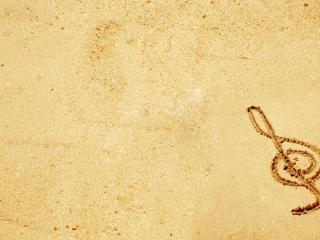 обои Скрипичный ключ на песке фото