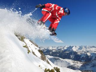 обои Сноубордист на снежном прыжке фото