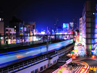 обои Вид вечернего города у железной дороги фото