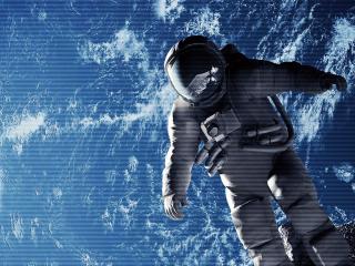 обои Космонавт в скафандре в открытом космосе фото