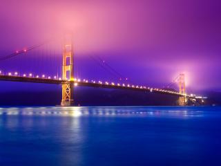 обои Огромный светящийся ночью мост фото