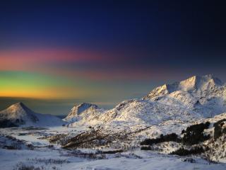 обои Заснеженные горы в зимней спячке фото