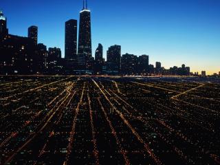 обои Светящиеся ровные кварталы вечернего города фото
