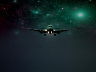 обои Самолет с включеными огнями вечерней порою в небе фото