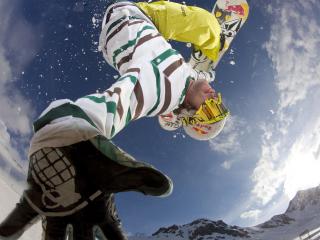 обои Сноубордист показал руку в прыжке фото